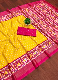 Attractive Yellow Color Patola Print And Foil Work Dola Silk Saree