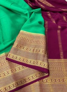 Awesome Green Woven Work Broad Contrast Border Saree